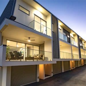 Appartment block building with glass balcony balustrades